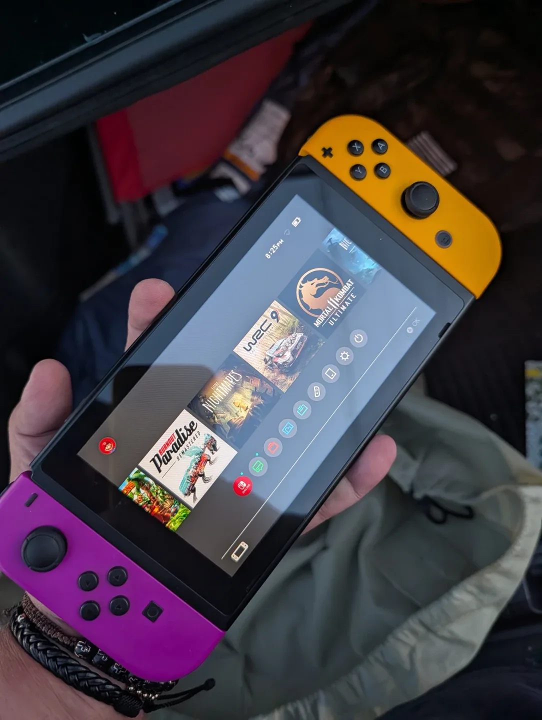 Nintendo Switch 1 Console with Purple and Yellow Joy-Cons - photo 2