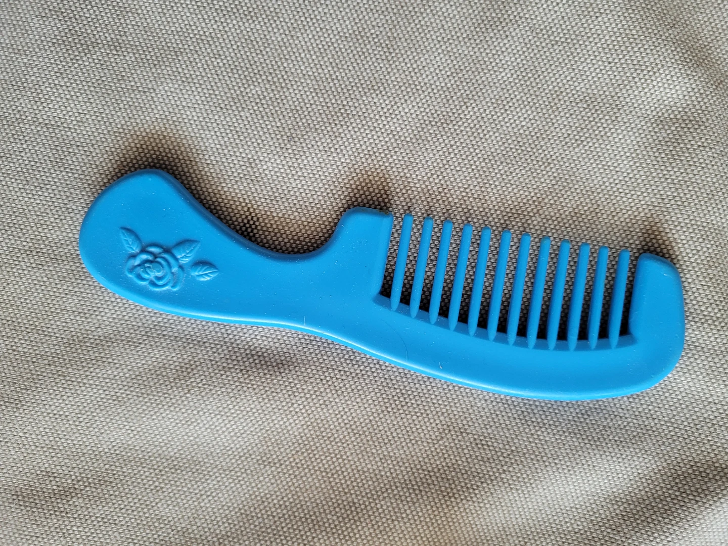 Blue Plastic Comb with Rose Design