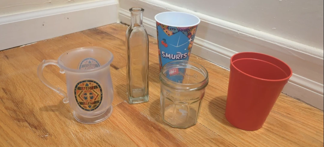Assorted Drinkware: Smurfs Cup, Butterbeer Mug & more