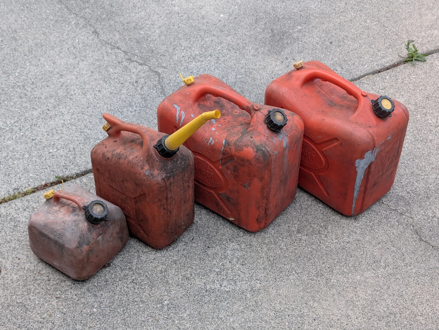 FREE: Four used gas cans, various sizes