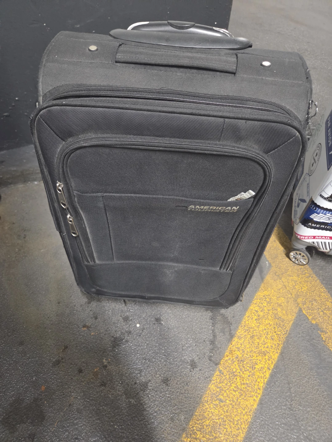 American Tourister Black Rolling Suitcase