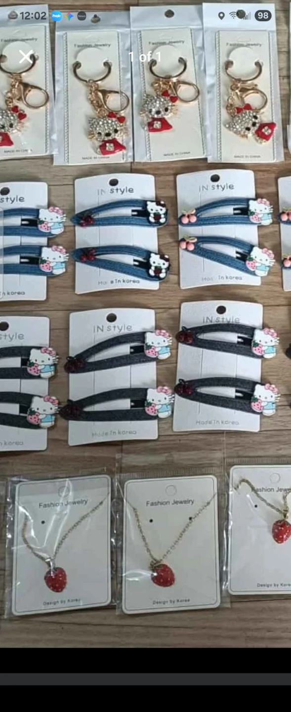 Hello Kitty Keychain, Hair Clips, and Necklaces