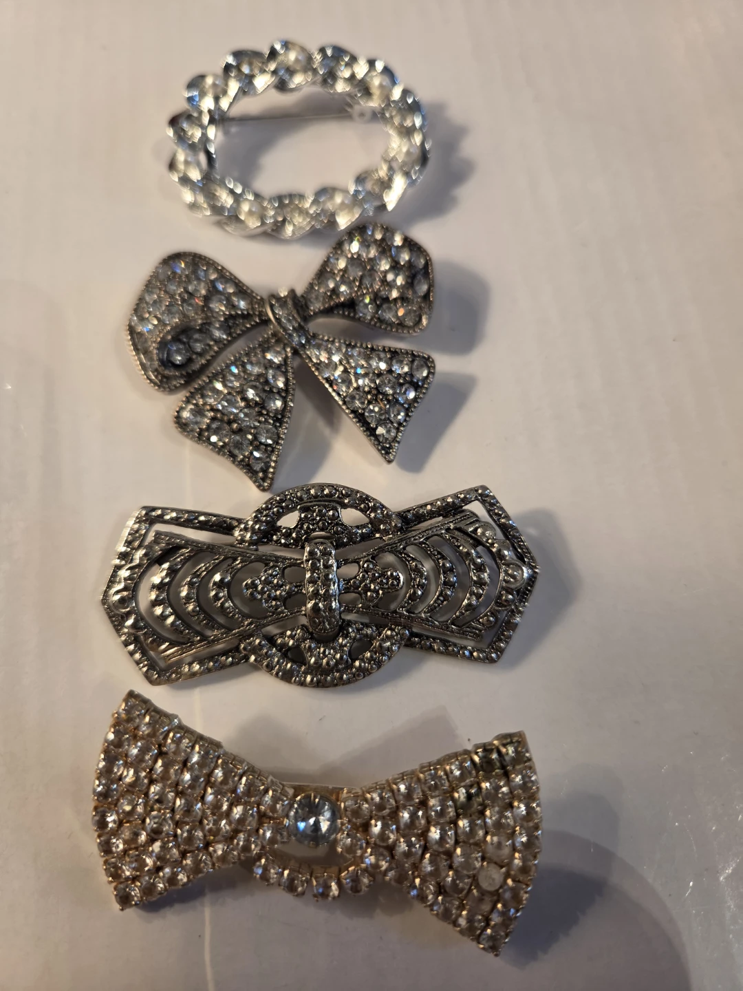 Set of 4 rhinestone brooches