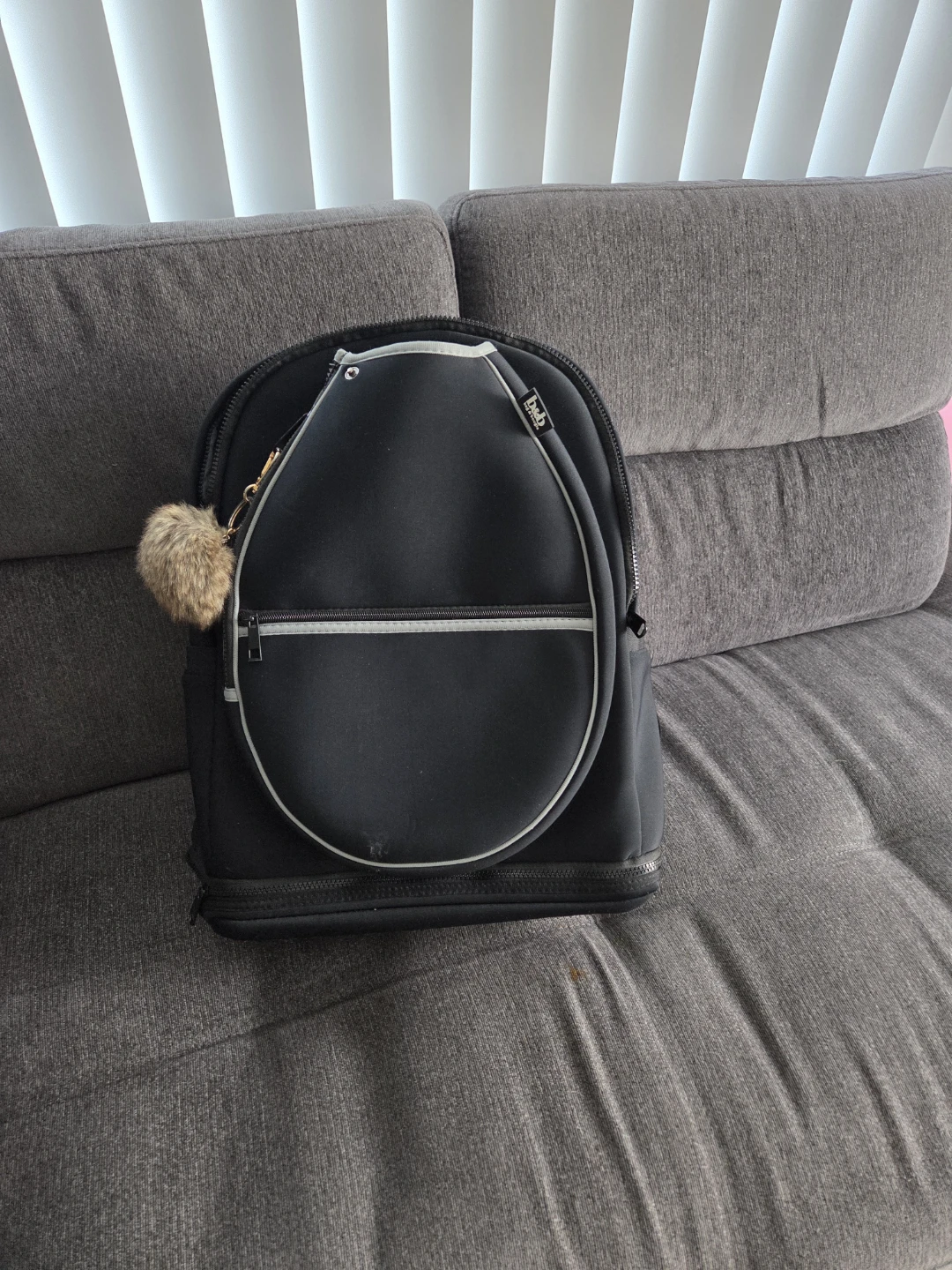 Black Backpack with Pom Pom Charm