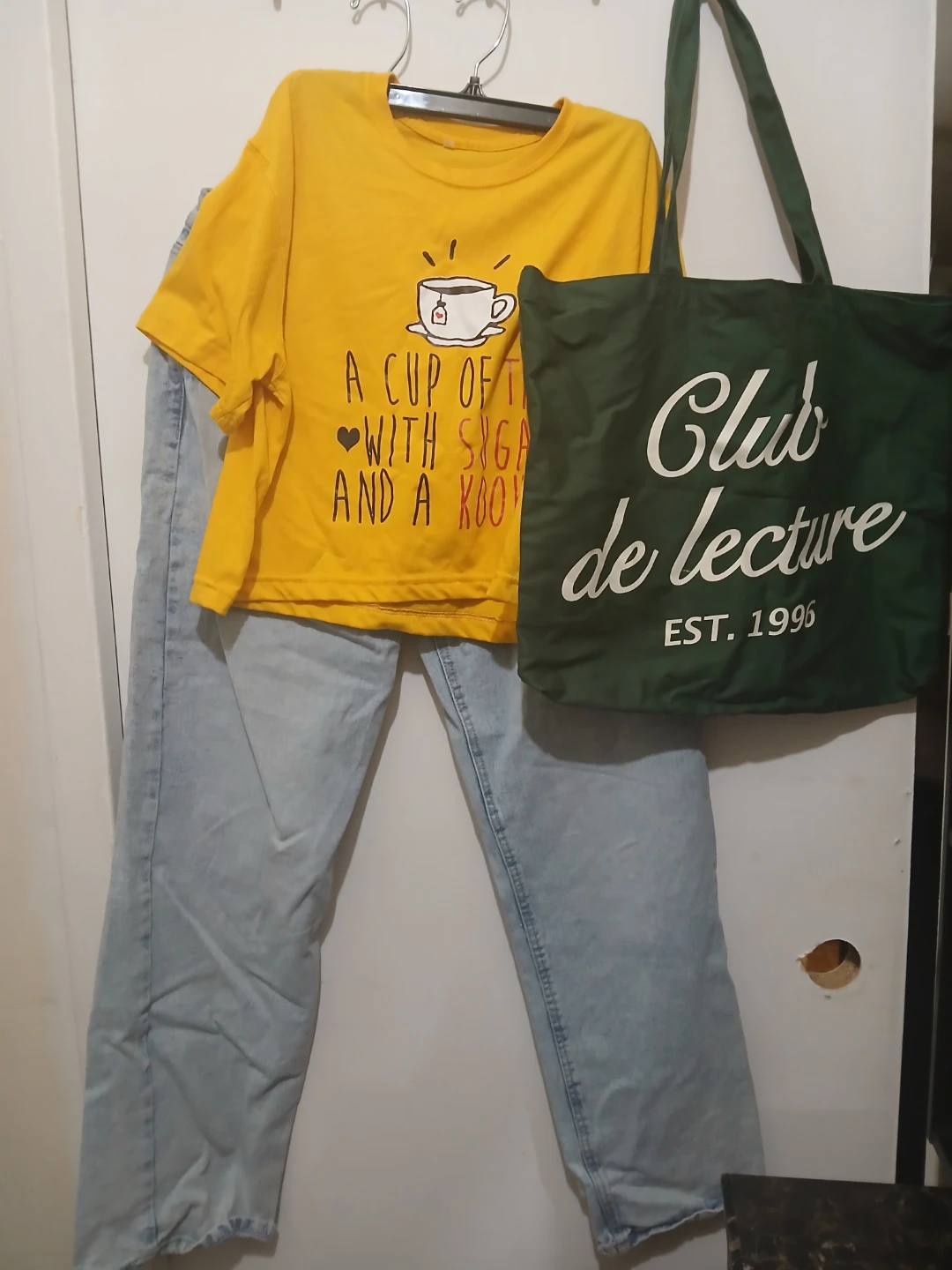 Yellow bts tee and light wash jeans with tote