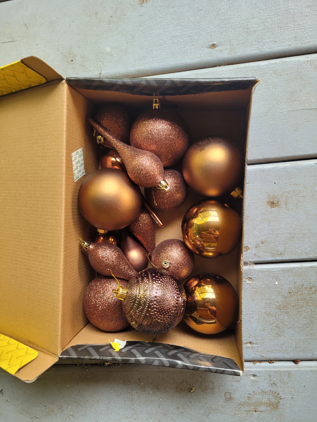 Box of copper Xmas decorations