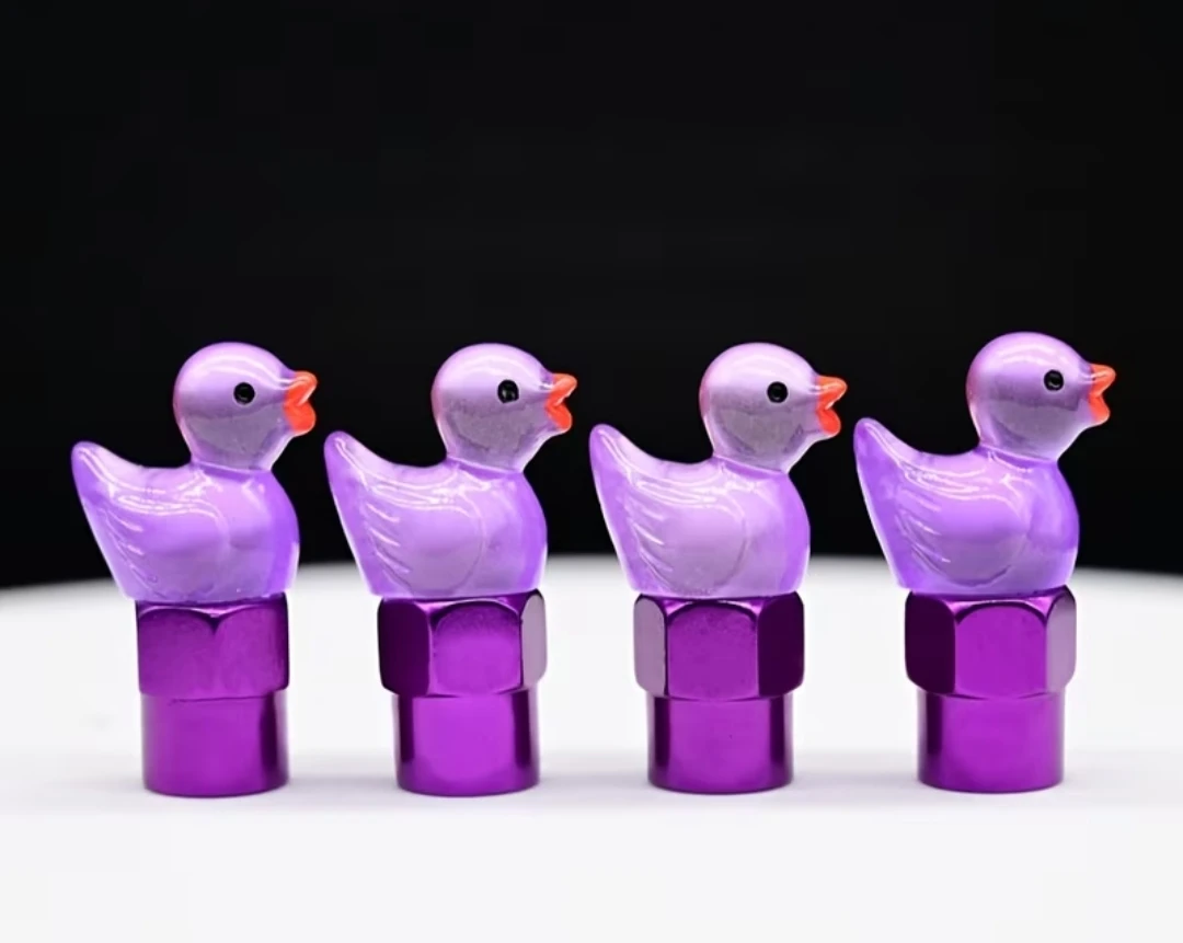 DUCK TIRE VALVE CAPS SET OF 4