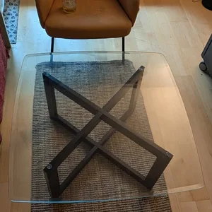 Glass coffee table with wooden base