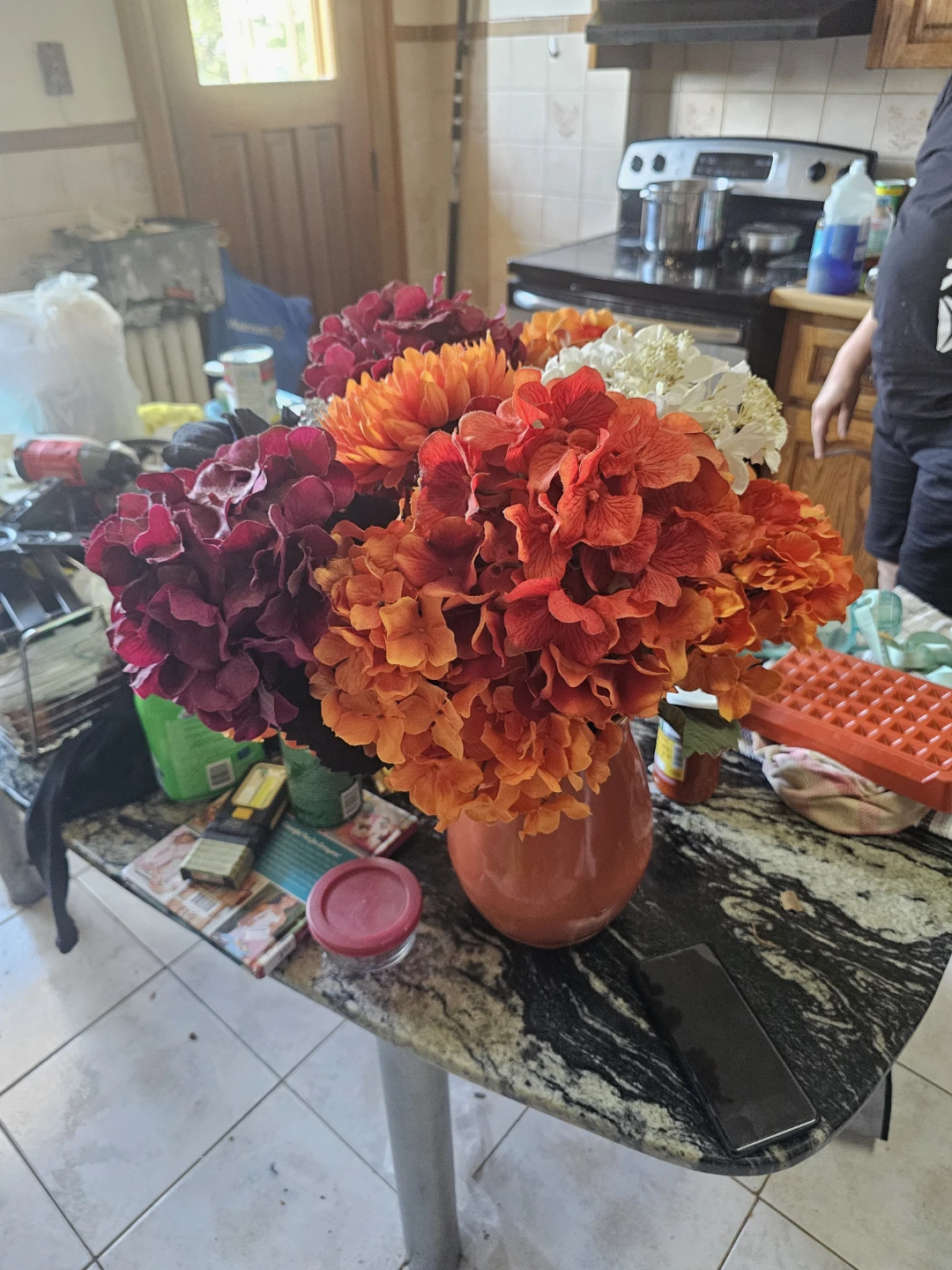 Orange Pitcher with Assorted Artificial Flowers