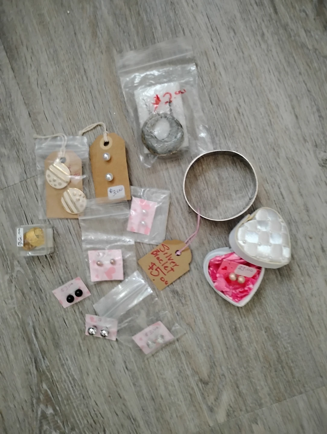 Assorted Earrings and Silver Bracelet