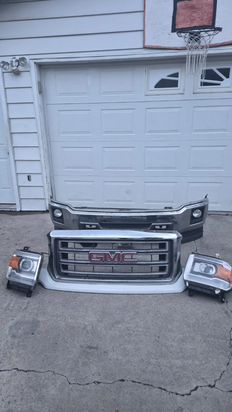 2015 GMC Sierra Headlights and Grille Assembly