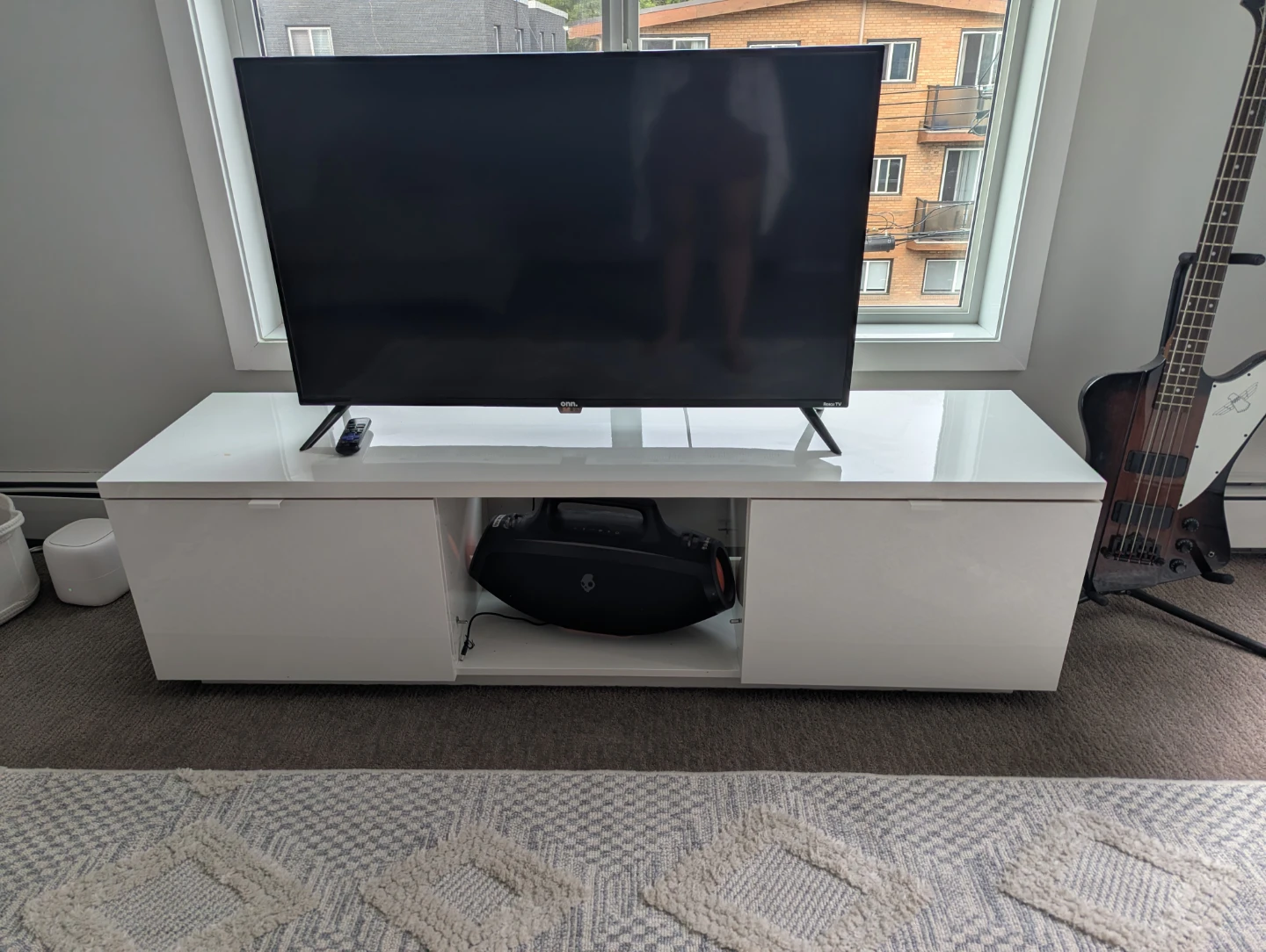 TV stand in a clean high-gloss white finish (with storage)