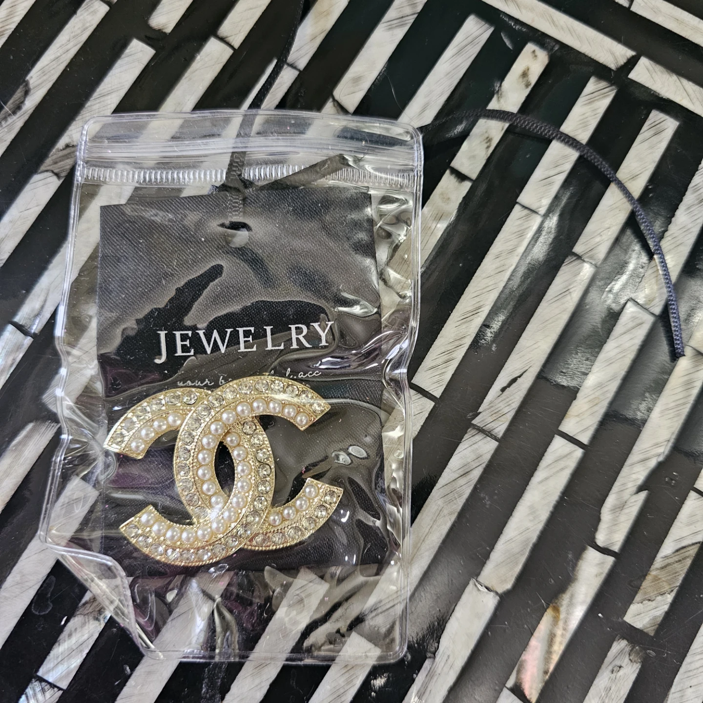Chanel CC Brooch