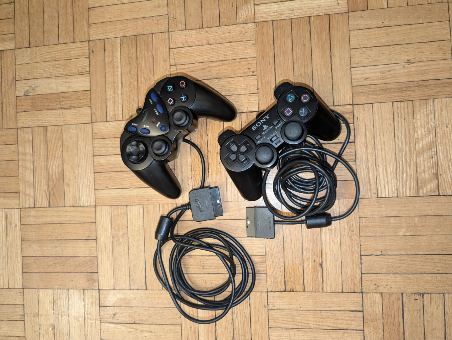 Pair of PS2 Controllers (Official Sony DualShock 2 + Intec)