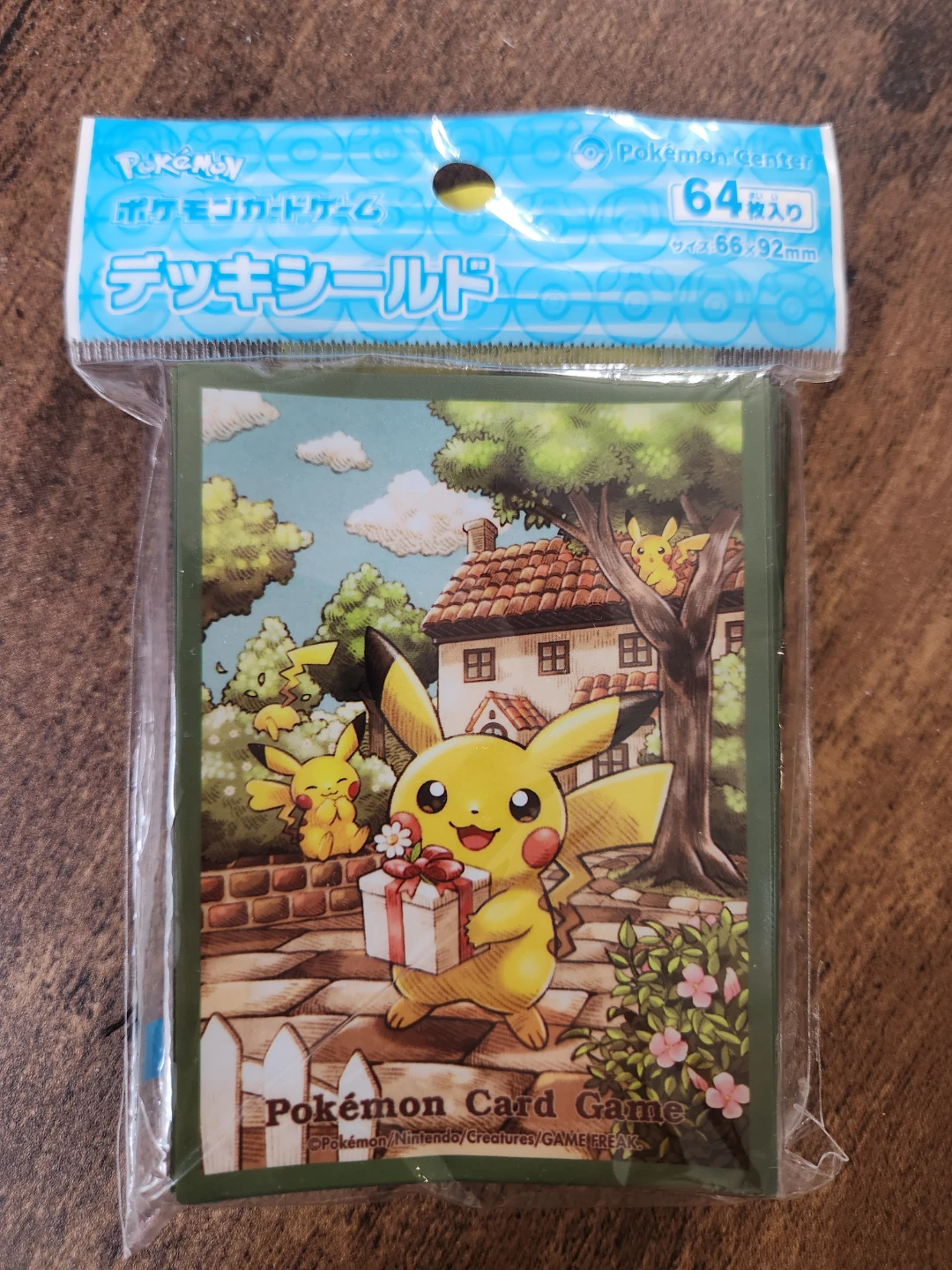 Pikachu's Gift Pokemon Card Game Sleeves Deck Shield 64PCS