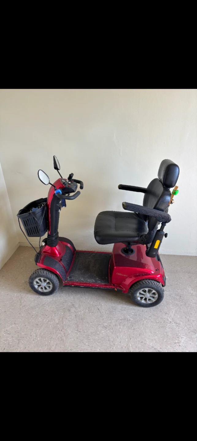 Red Mobility Scooter with Basket