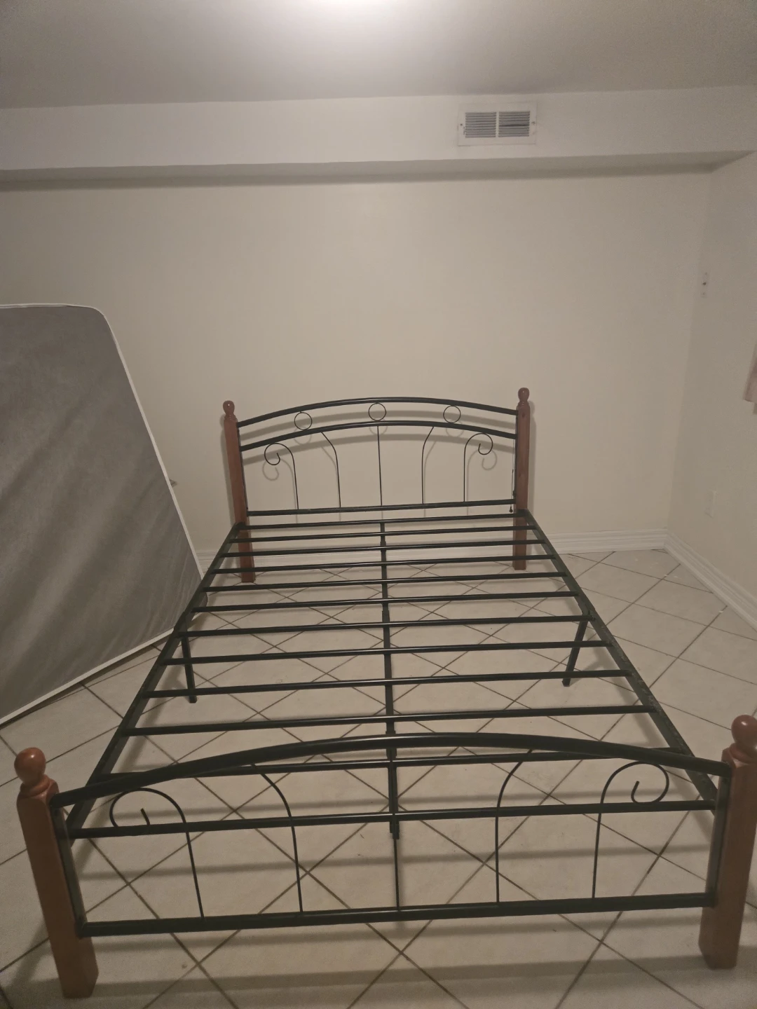 Metal Bed Frame with Wooden Accents