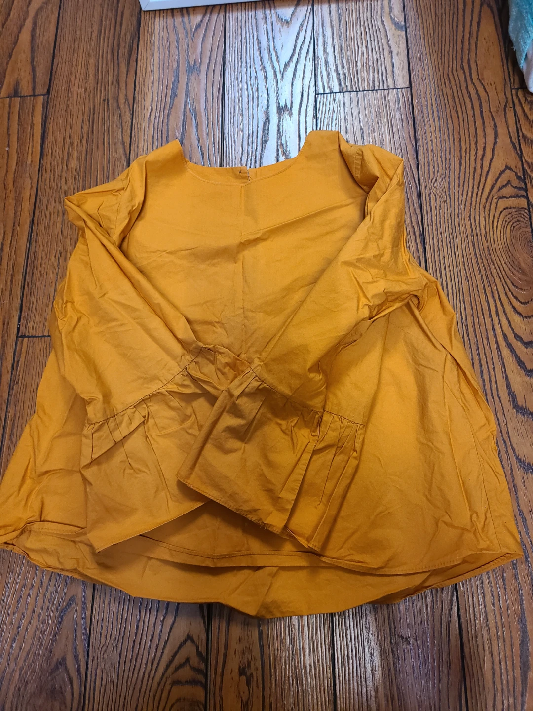 Orange long-sleeve blouse