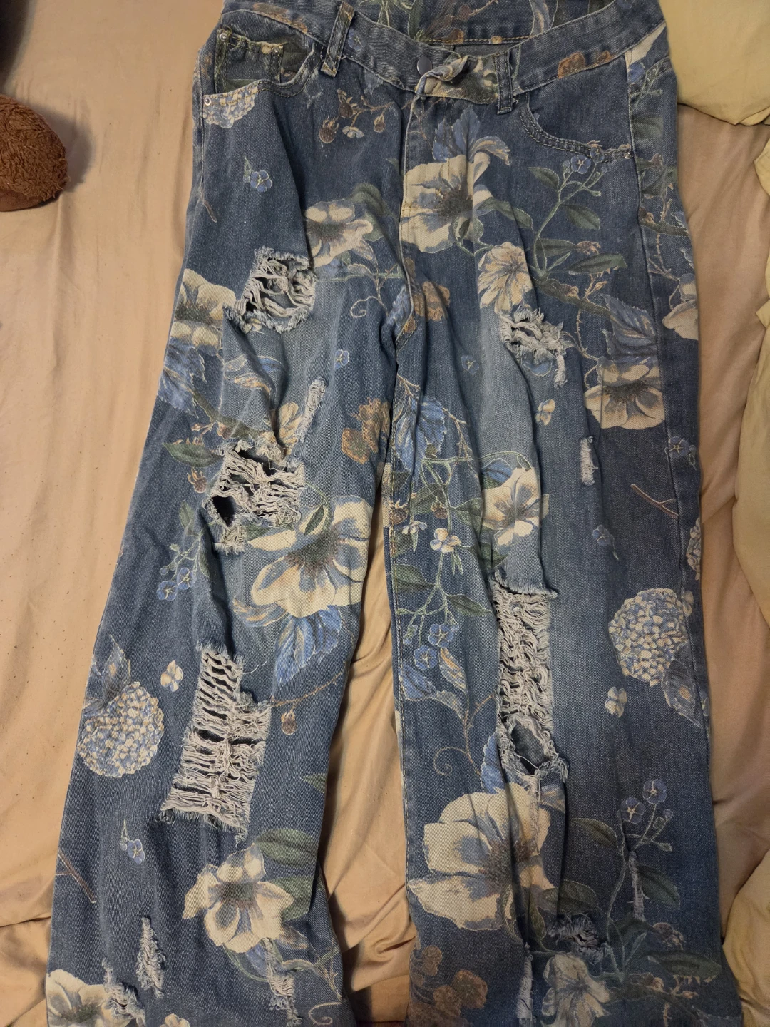 Floral ripped jeans