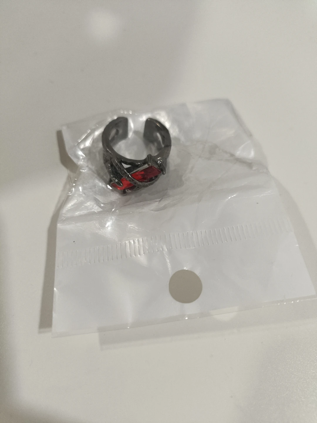 Adjustable Dark Metal Ring with Red Gem