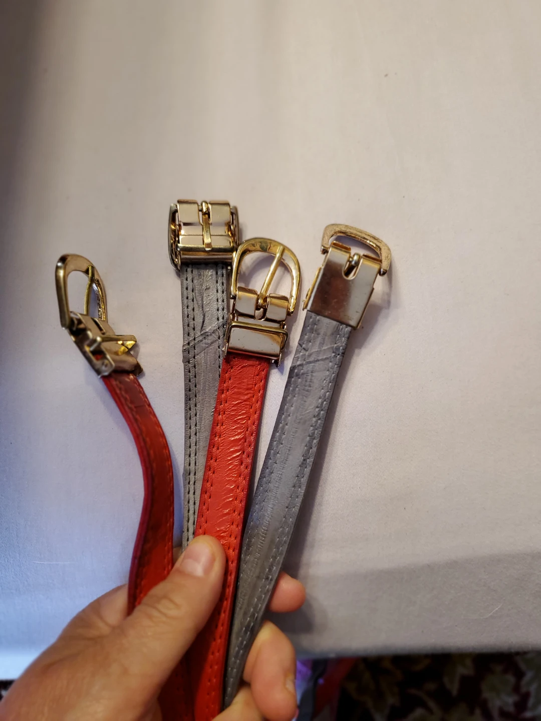 Three Fashion Belts - Red, Grey, and Red with Circular Buckle