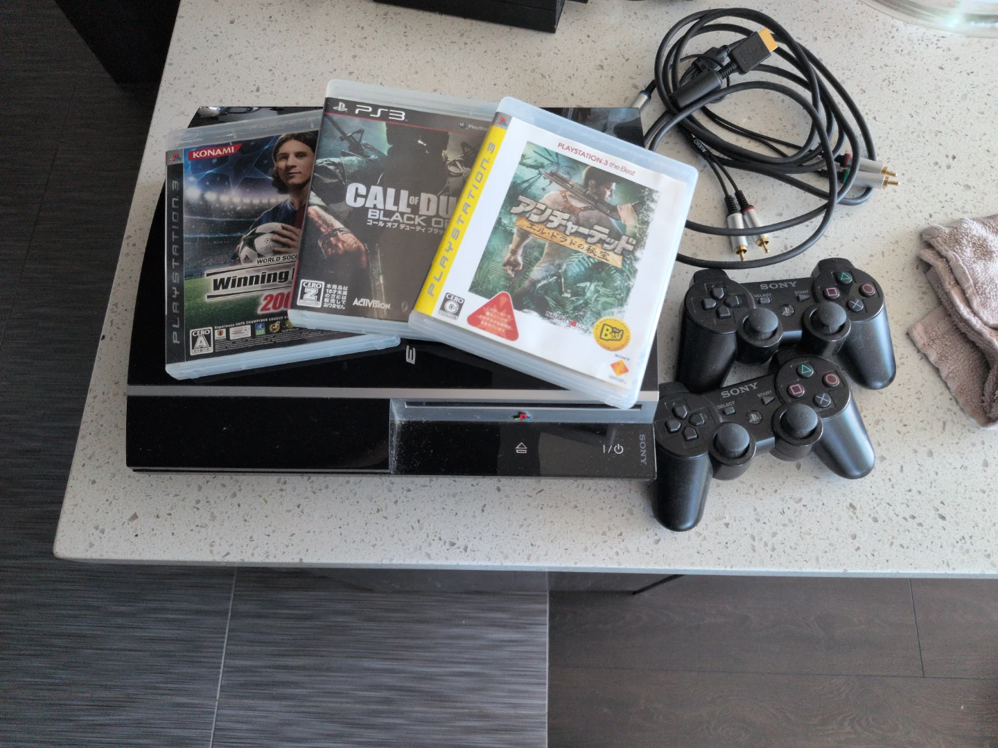 Sony PlayStation 3  with 2 Controllers and 3 Games