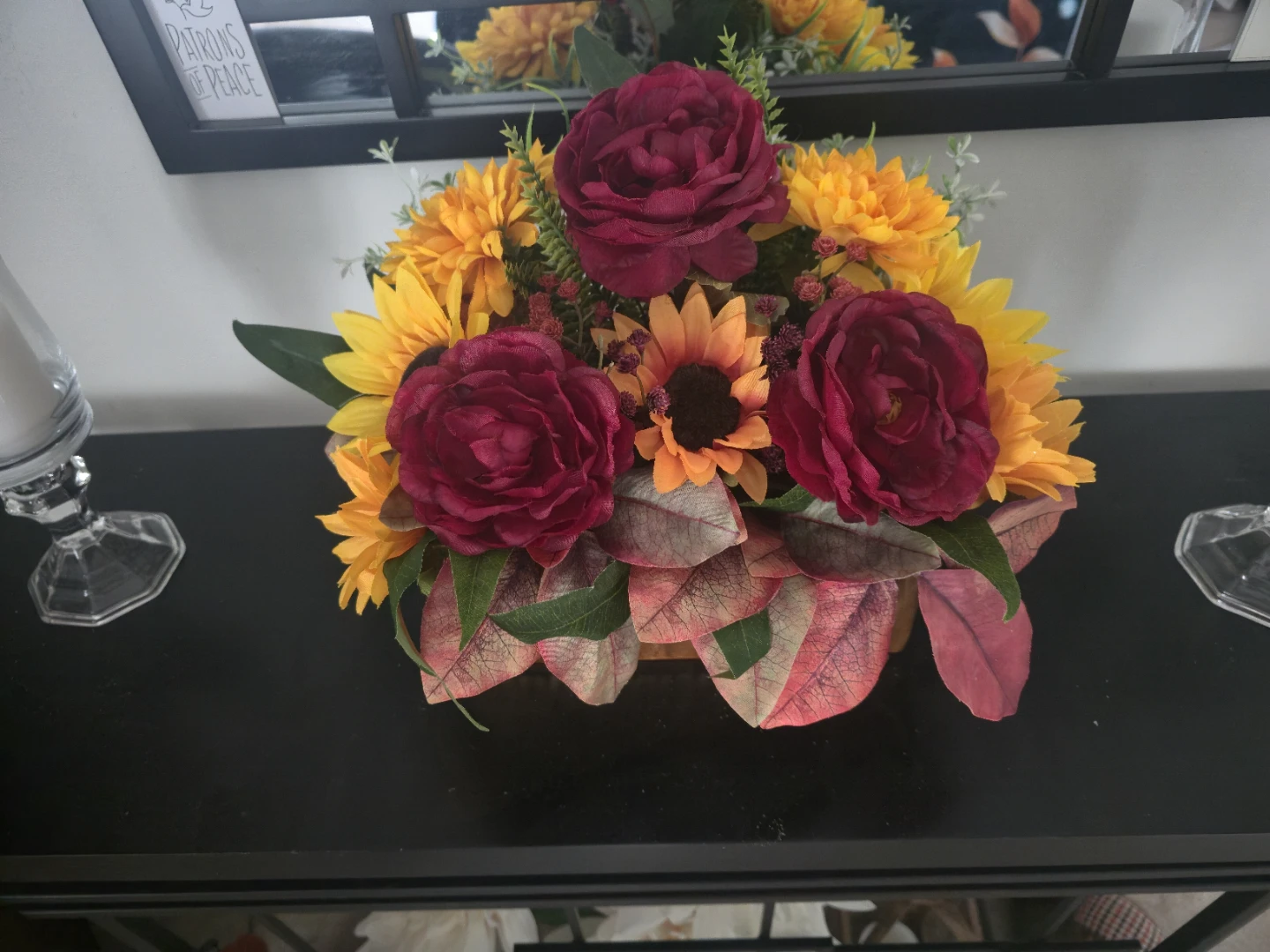 Fall faux flowers arrangement in gold planter