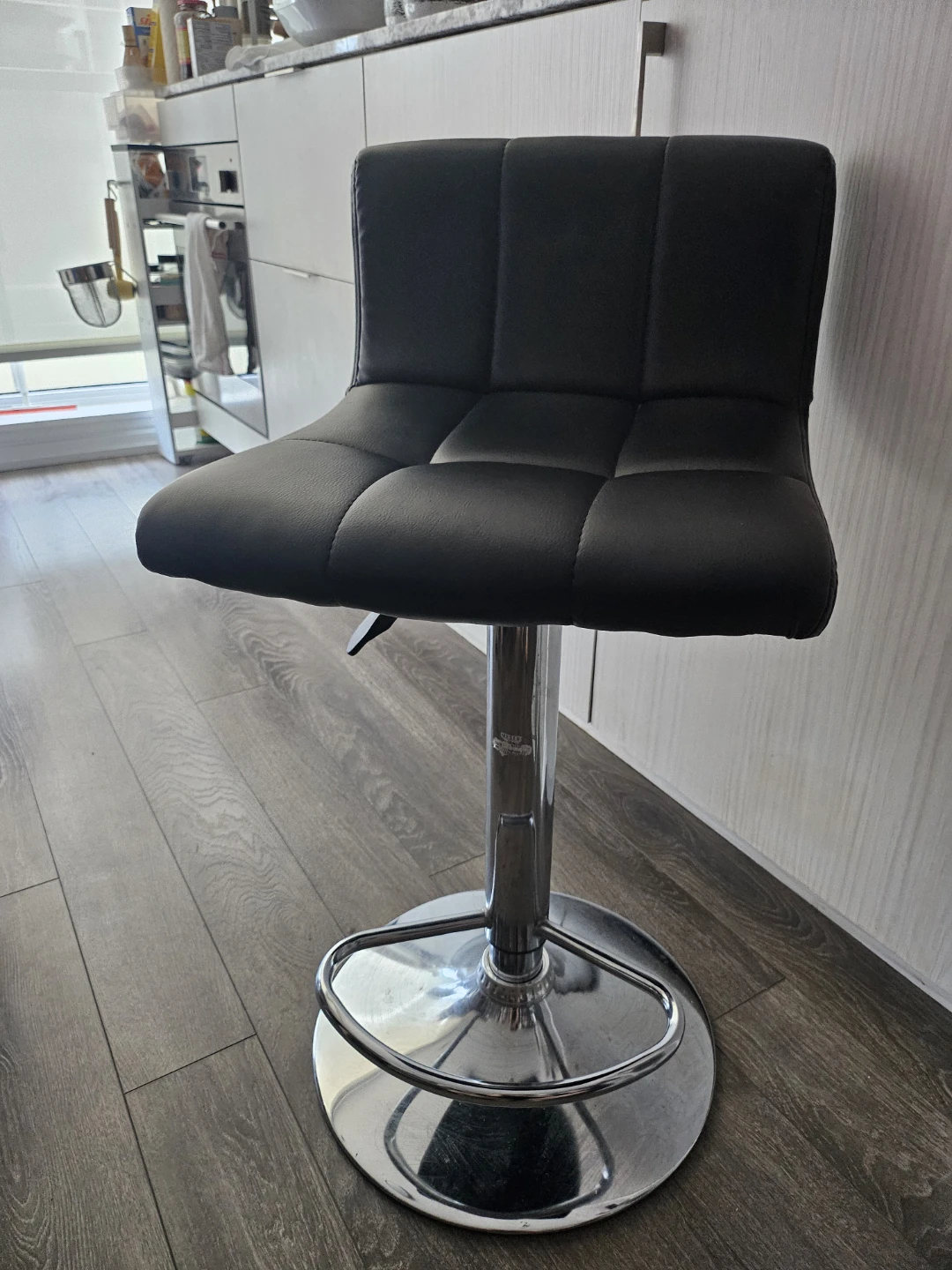 Black adjustable bar stool