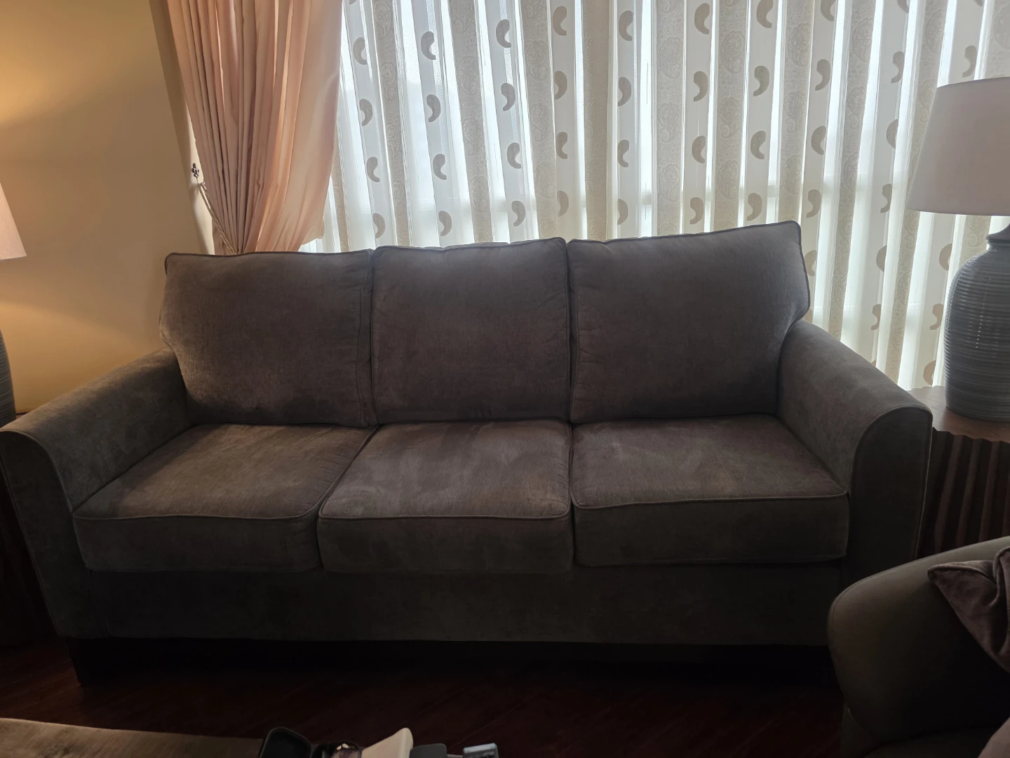Grey three-seater couch