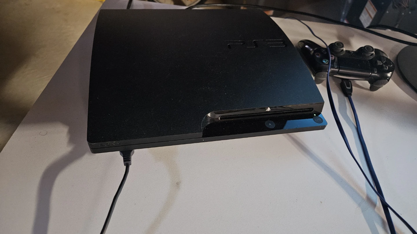 Sony PlayStation 3 Console with 2 Controllers