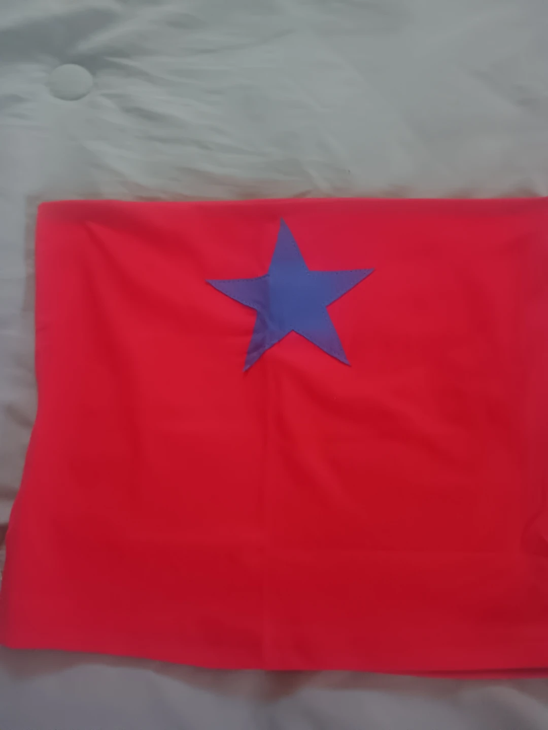 Red strapless top with blue star