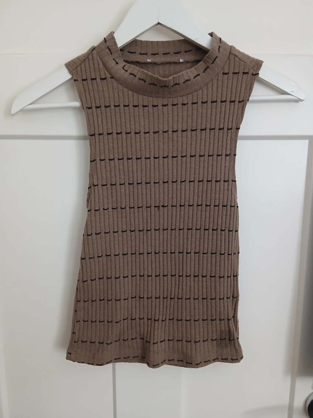 Brown ribbed sleeveless mock neck top