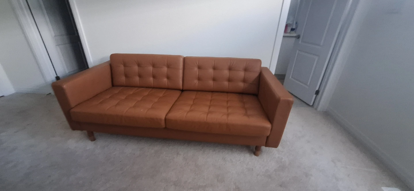 Brown Tufted Sofa
