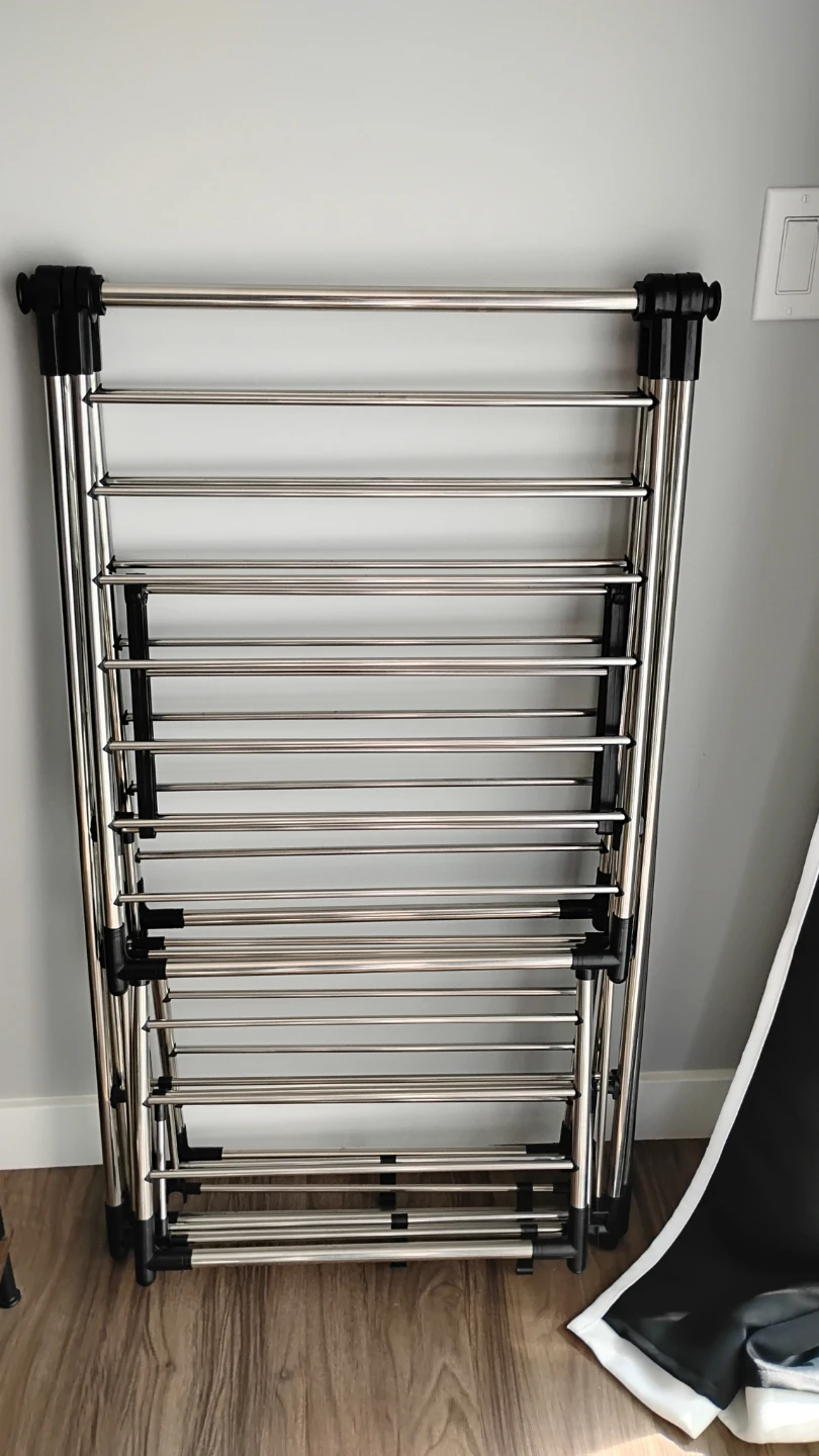 Foldable stainless‑steel drying rack in great condition.