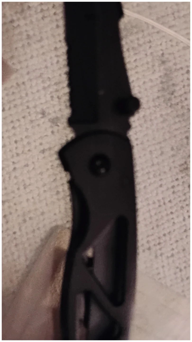 Black Folding Knife with Serrated Edge