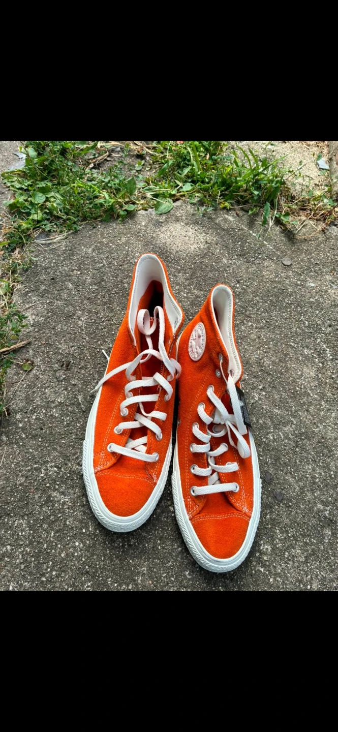 Orange Converse Chuck Taylor All Star High Top Sneakers