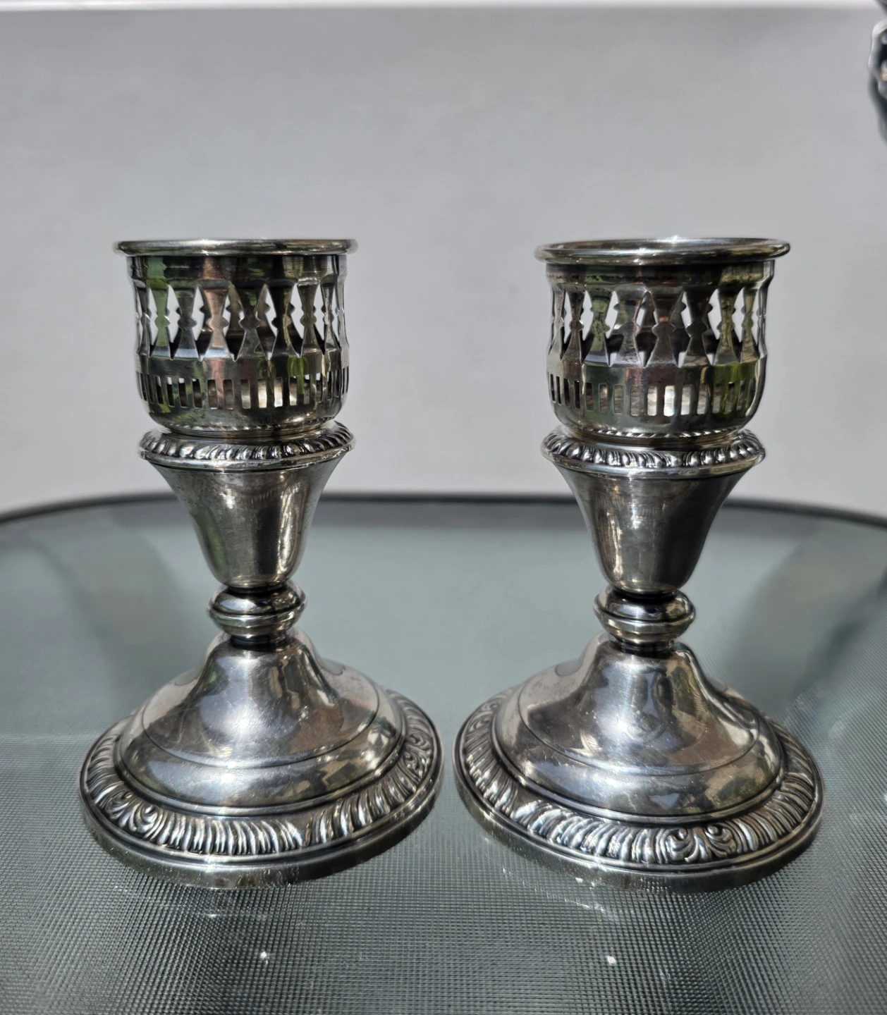Pair of Waited Sterling Silver Candlesticks - Rank M. White Co.