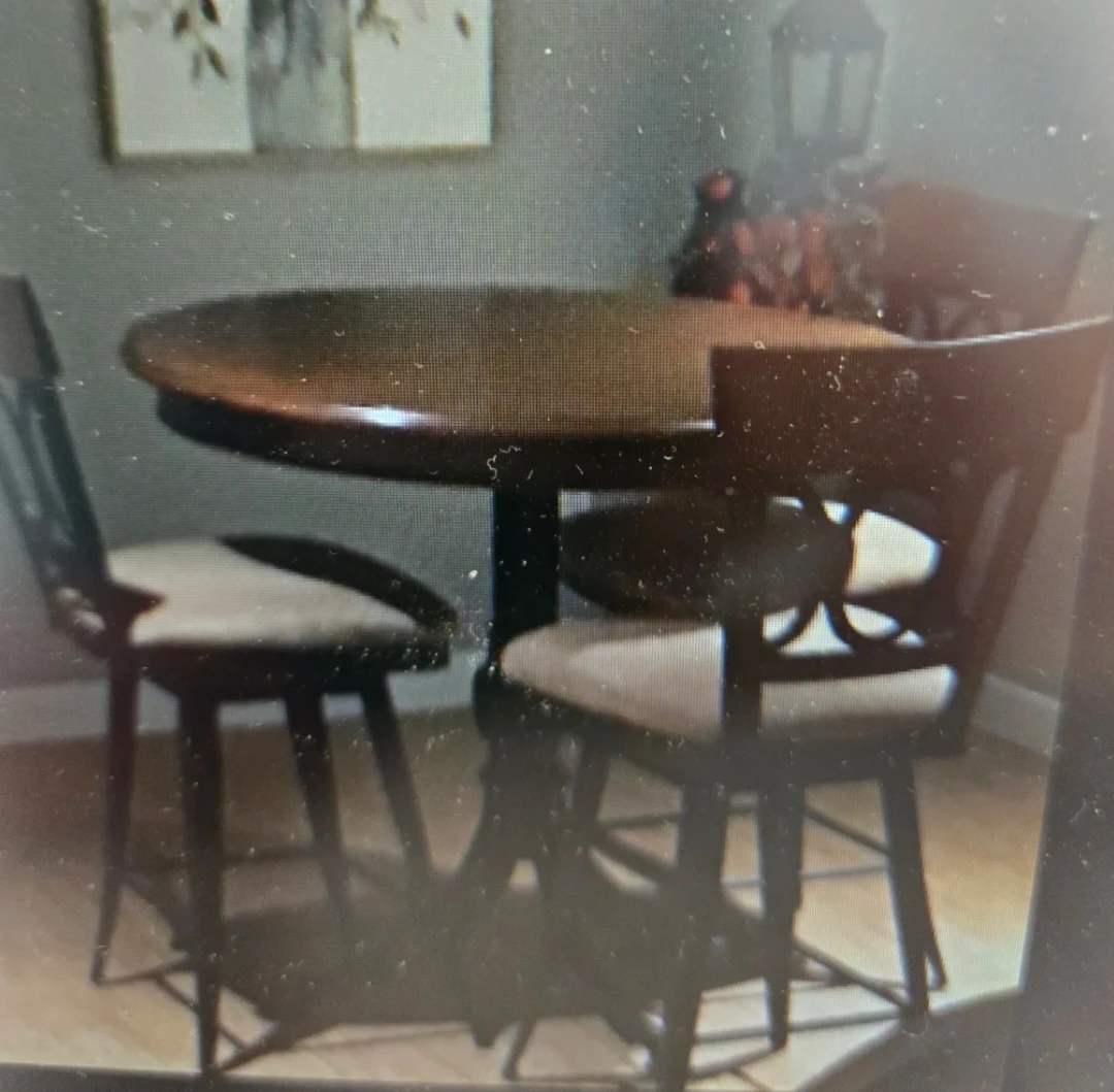 Sturdy round table and swivel stools