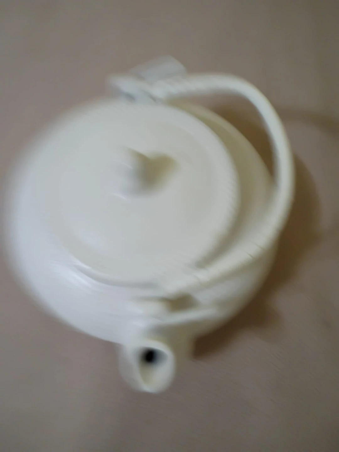 White Ceramic Teapot with Strainer