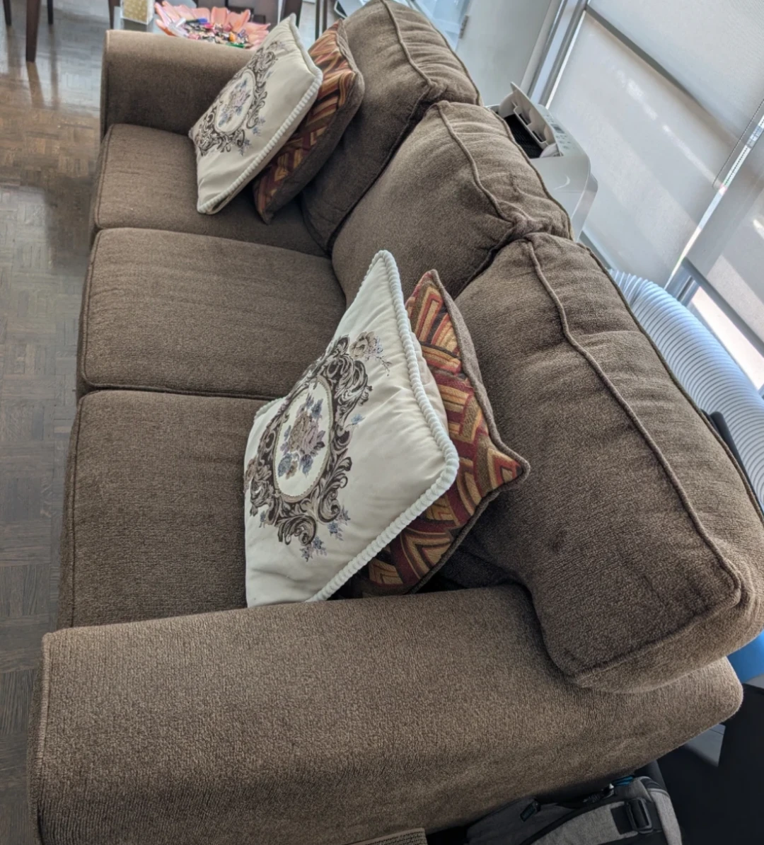 Leon's Brown upholstered couch with decorative pillows - photo 5