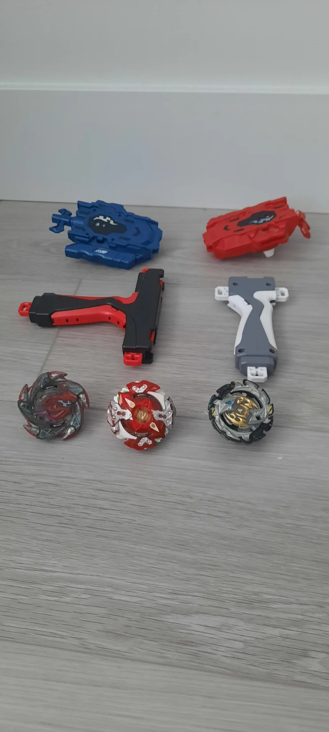 Beyblade Lot - 3 Beyblades, 2 Launchers, 2 Grips