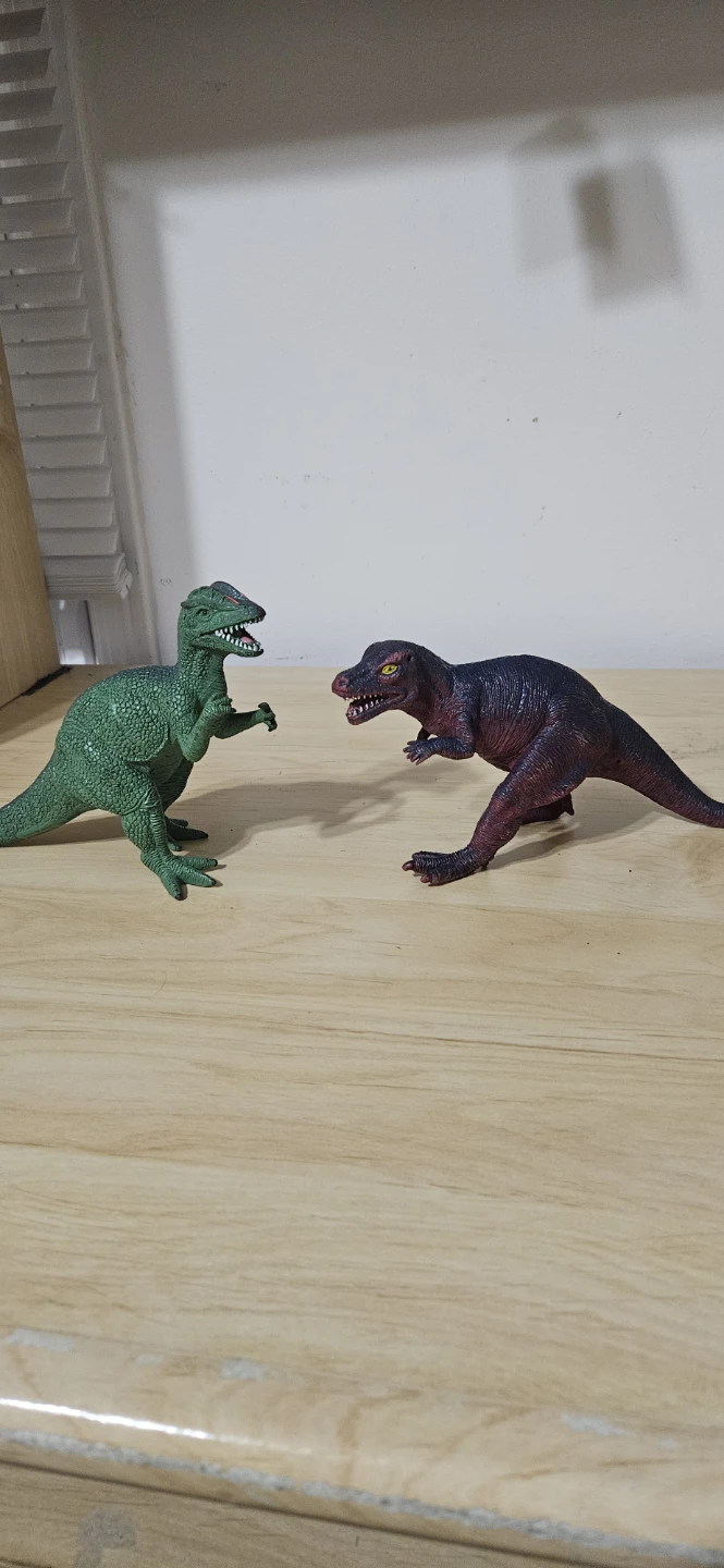 Two Dinosaur Figurines