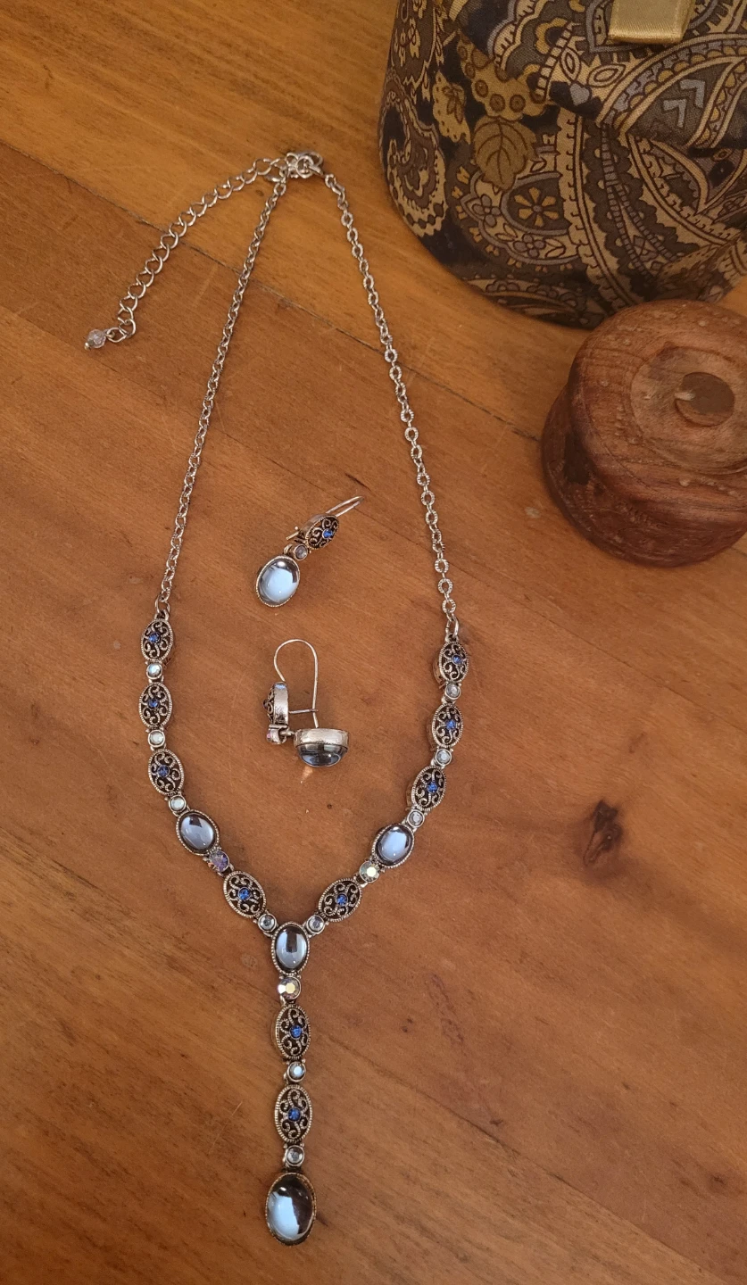 Silver and blue necklace and earrings