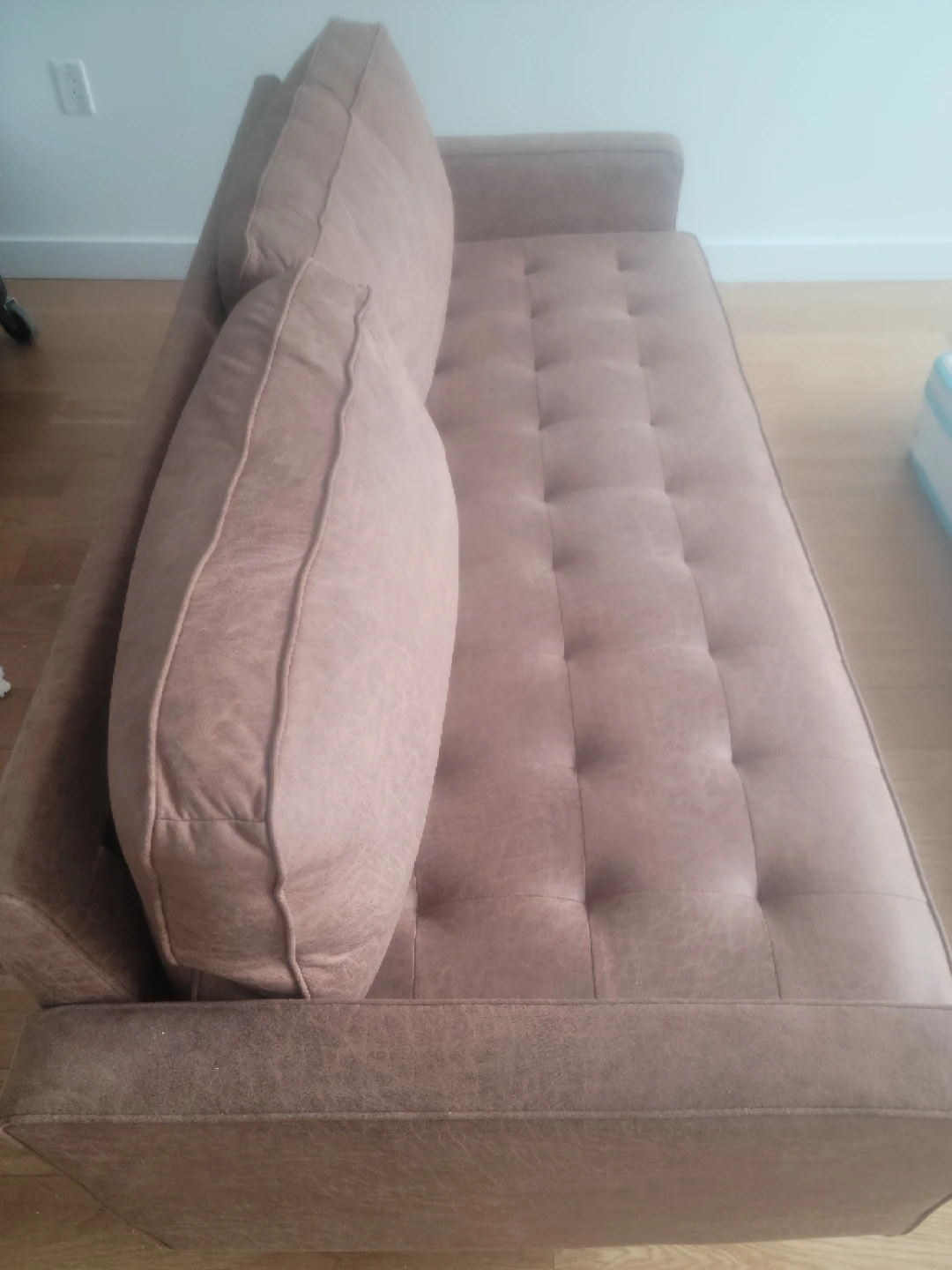 Brown Tufted Sofa with Pillows