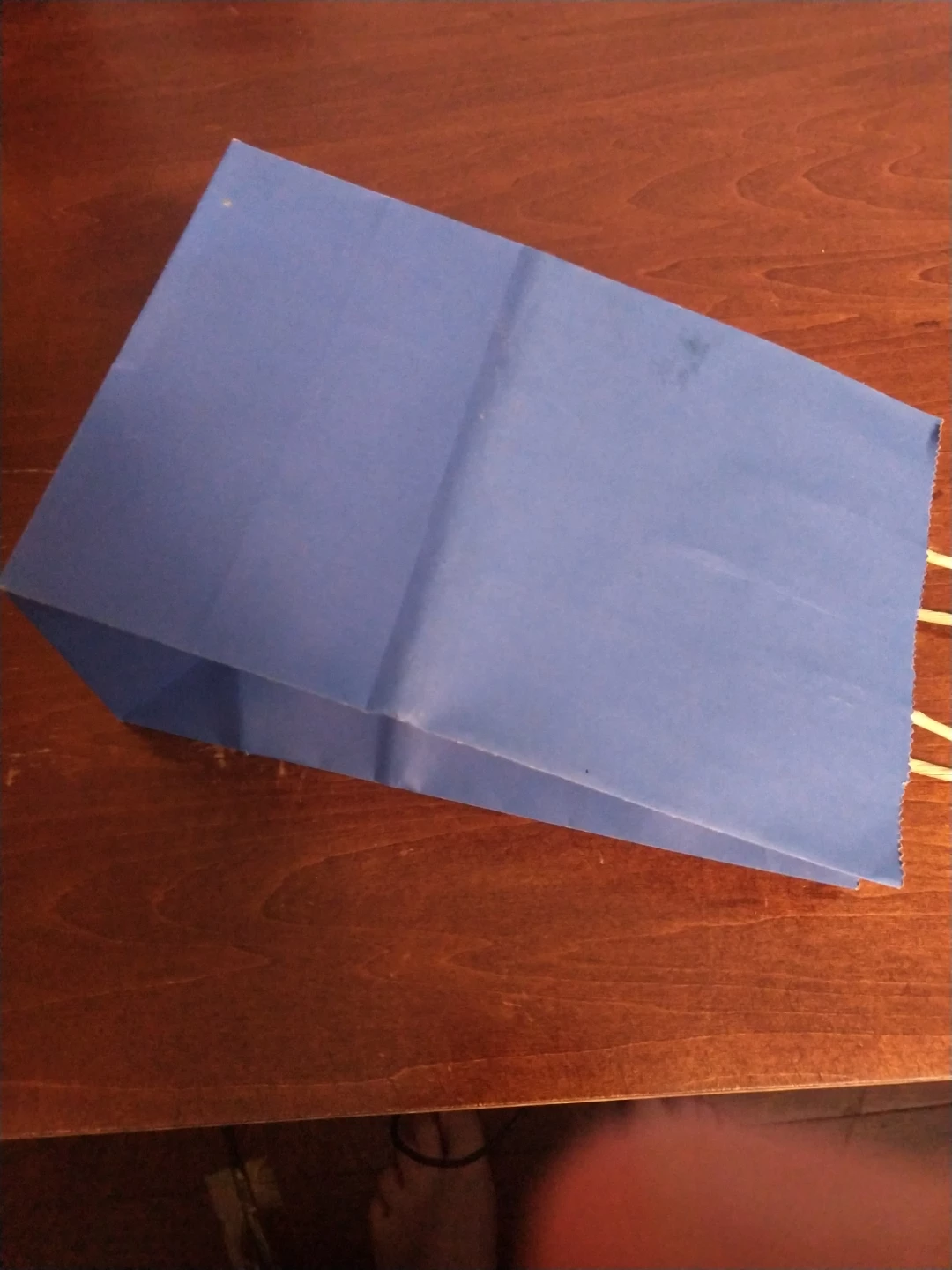 Small blue gift bag