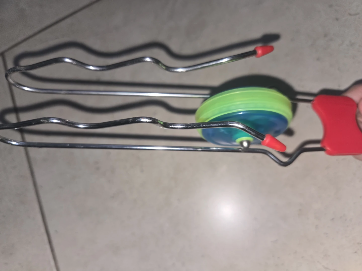 Metal Spinning Top on Tracks Toy with Red Handle