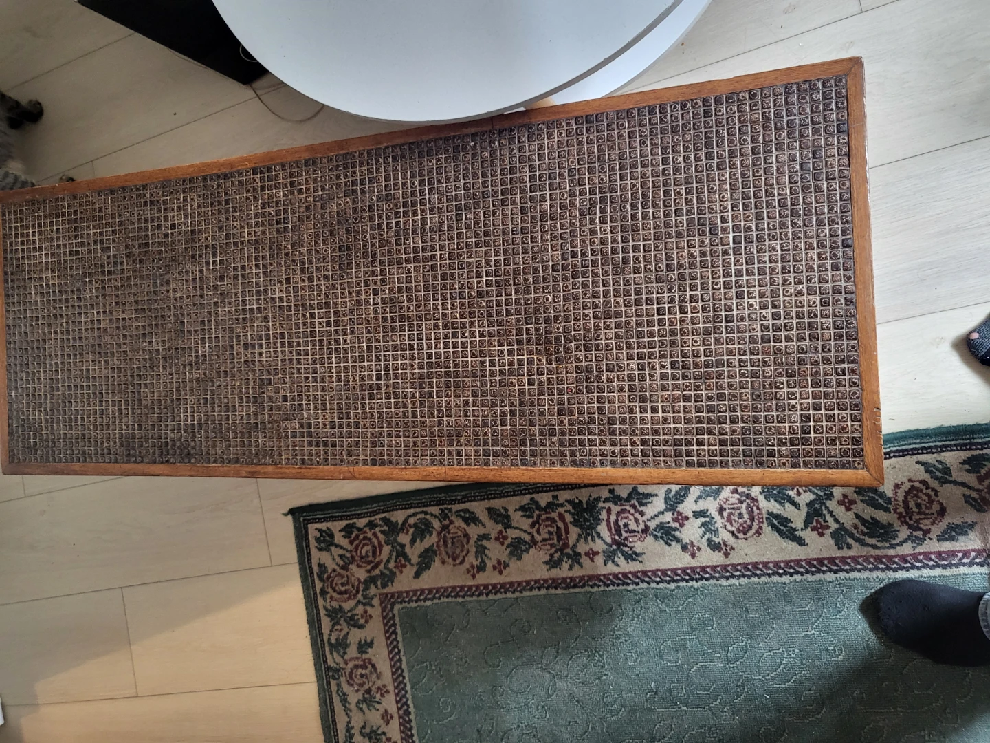 Wooden bench with woven seat