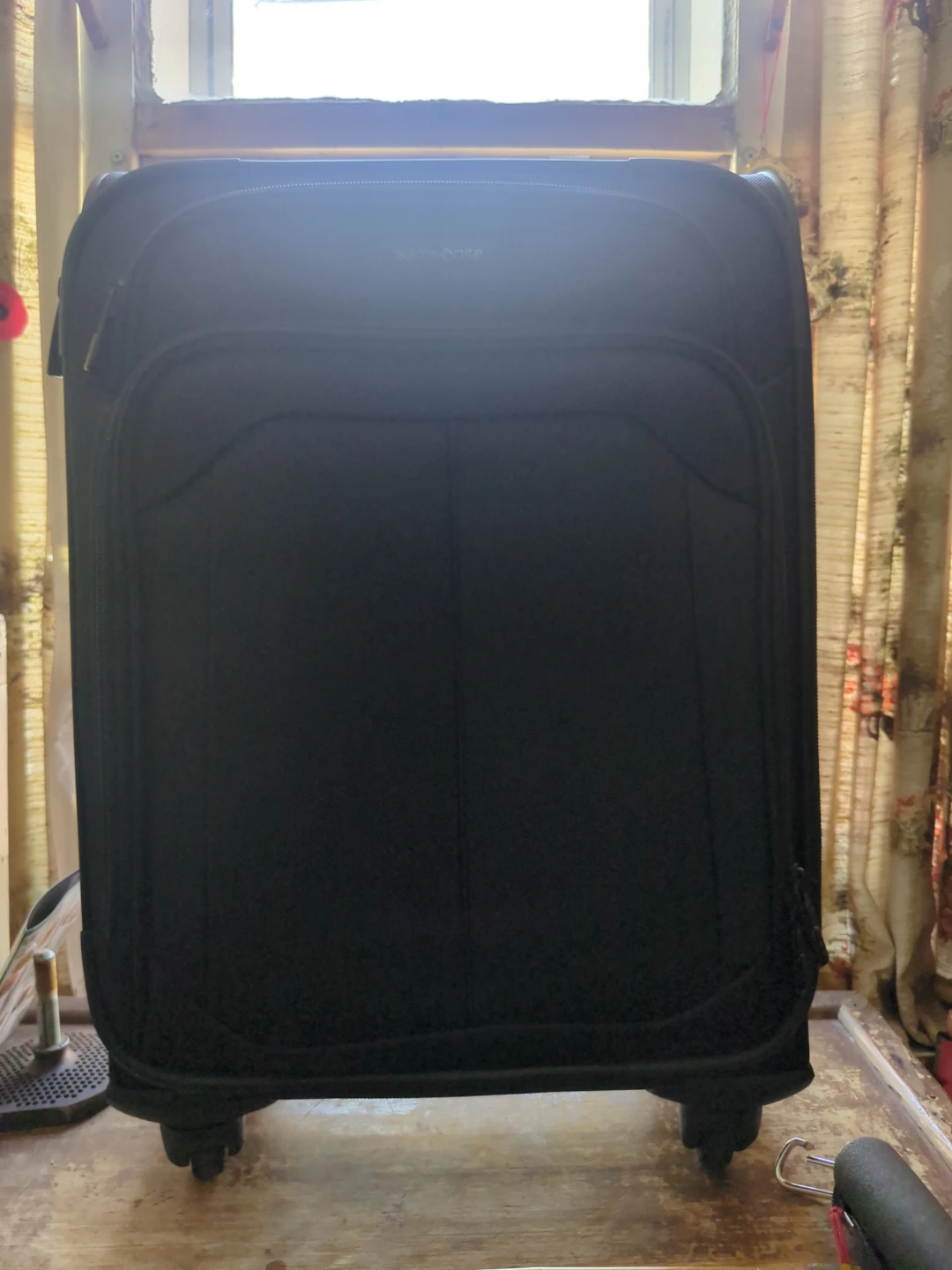 Samsonite Black Rolling Suitcase