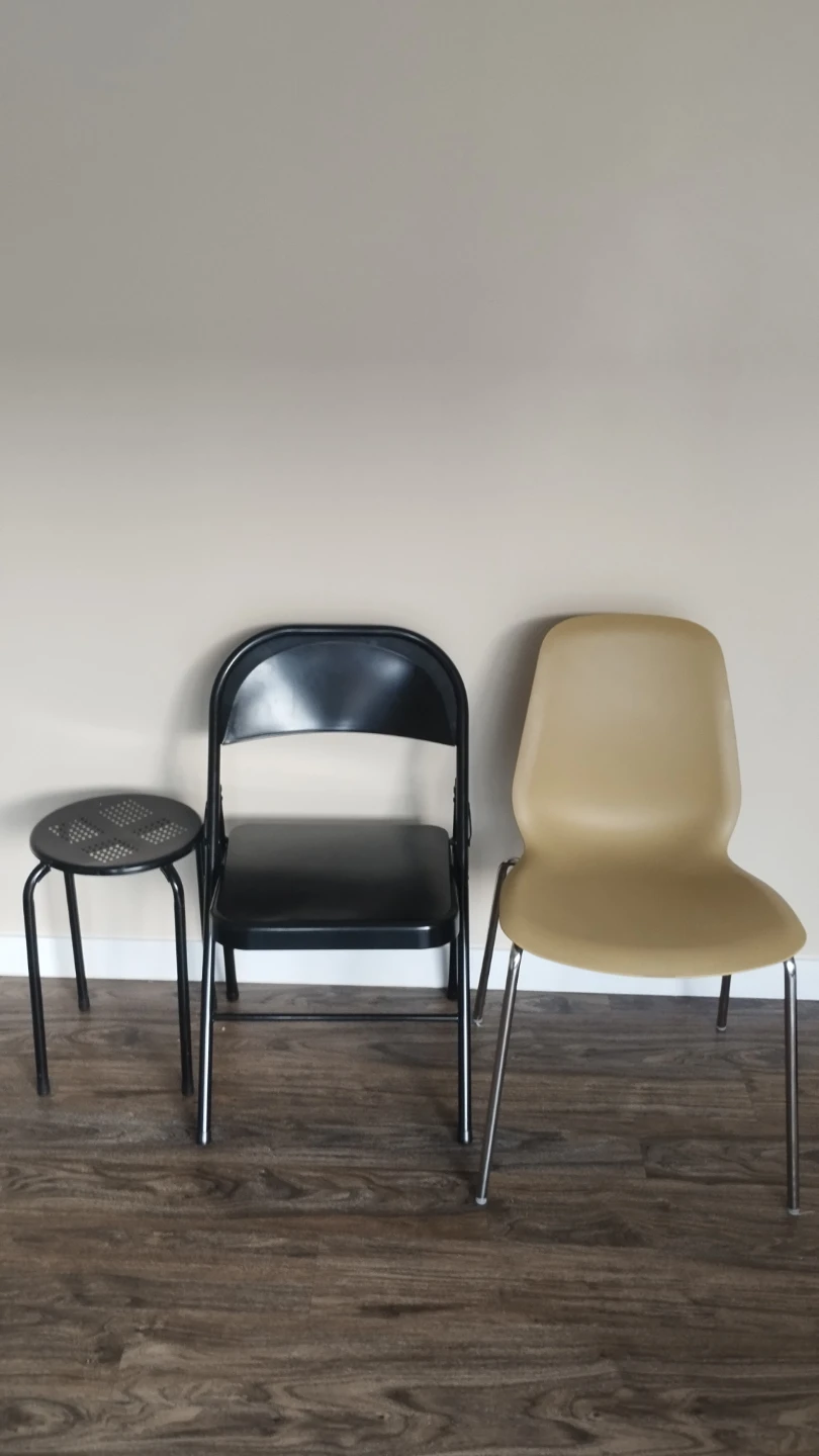 Free Black Folding Chair and Tan Plastic Chair