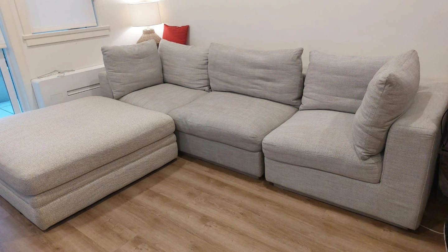 3 seater modular couch and ottoman.
